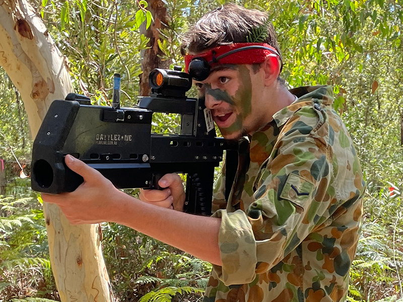 Intense laser tag combat in the bushland arena